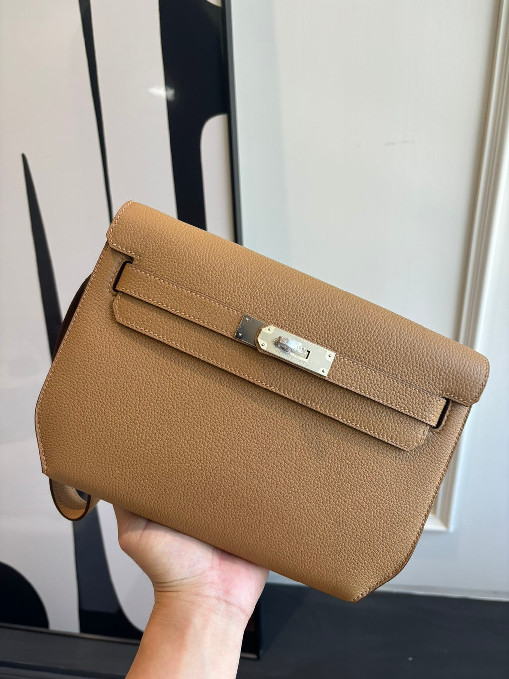 Hermes tan leather shoulder bag with flap and metal clasp