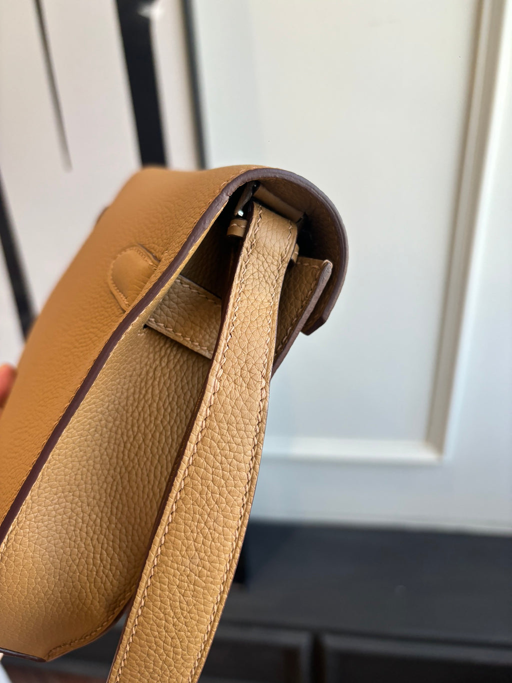 Hermes tan leather bag interior view with strap and lining