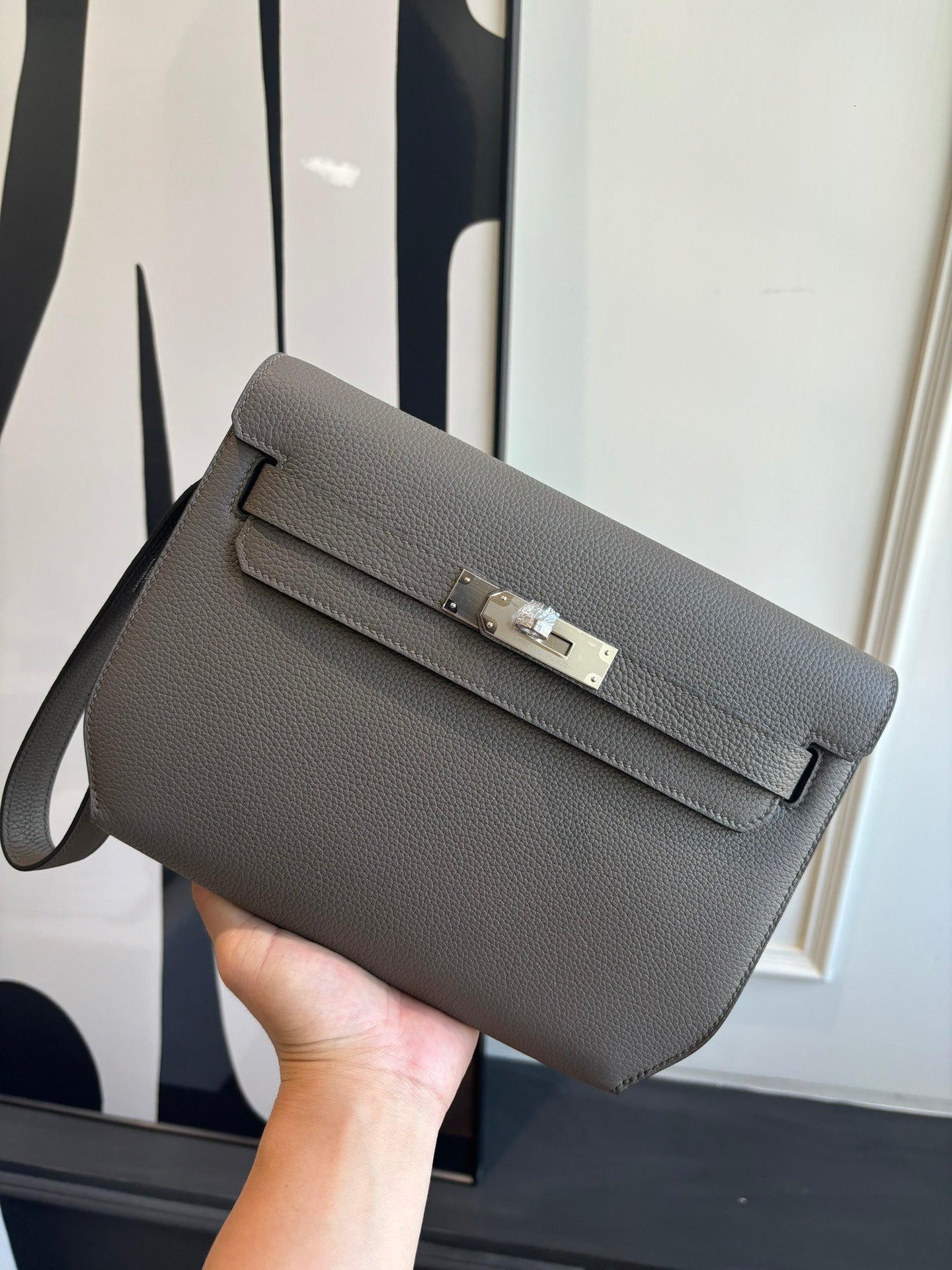 Hermes leather flap shoulder bag, textured gray with silver hardware and top handle strap