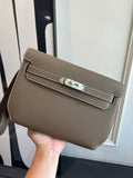 Hermes leather crossbody bag in taupe, front flap with silver turn-lock hardware