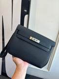 Hermes navy leather shoulder bag with flap and adjustable strap, gold clasp