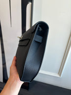 Hermes textured leather shoulder bag side view with flap and open top