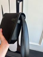 Hermes handbag with long shoulder strap and side flap pocket