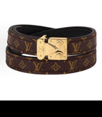 Louis Vuitton monogram leather bracelet with gold-tone clasp, brown and dark.