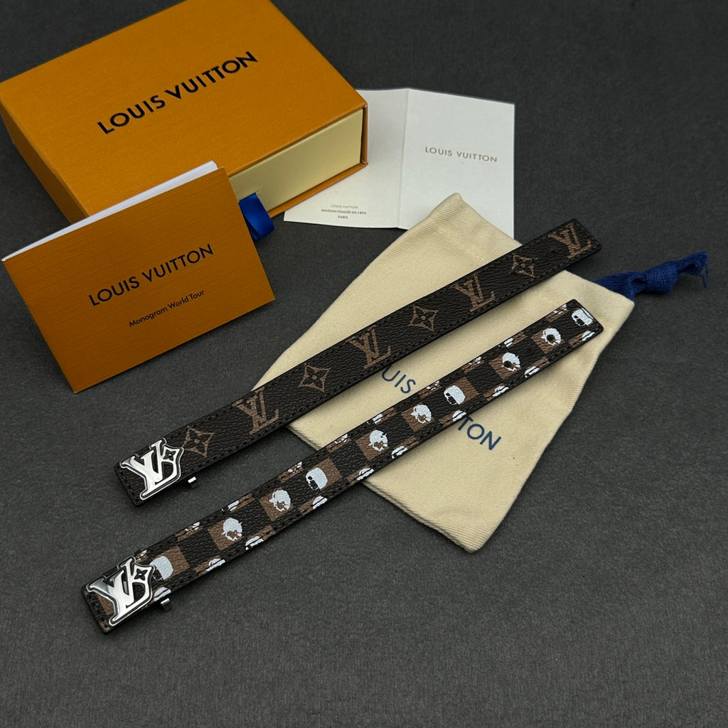 Louis Vuitton monogram strap with metal studs, shown with cream dust pouch
