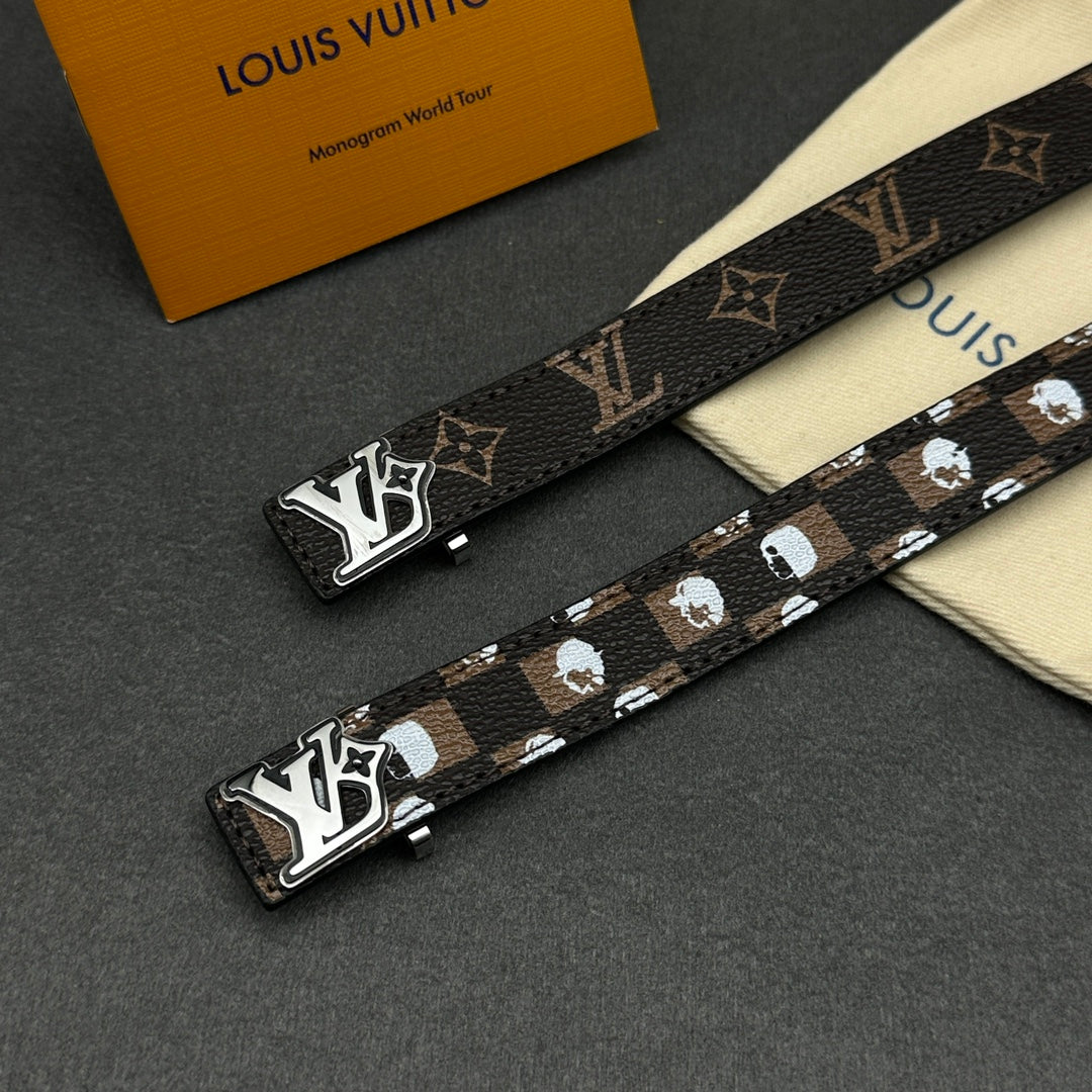 Louis Vuitton monogram strap with silver buckle ends, laid across cream pouch