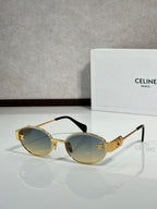 Round sunglasses with gold frame and dark brown tinted lenses