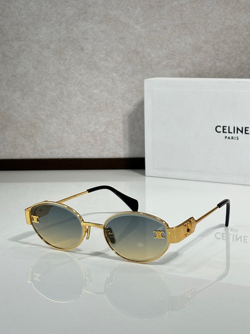Round sunglasses with gold frame and dark brown tinted lenses