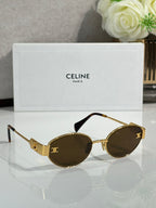 Side-view round sunglasses with gold frame and dark tinted lenses