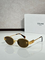 Round sunglasses with gold frame and deep brown tinted lenses