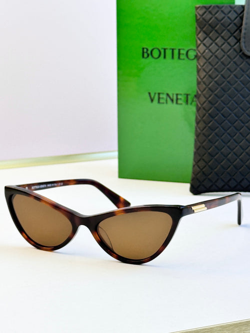 Tortoise cat-eye sunglasses with brown lenses and gold-tone temple tips
