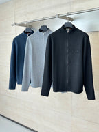 Long-sleeve zip jackets on hangers, black and gray, stand collar