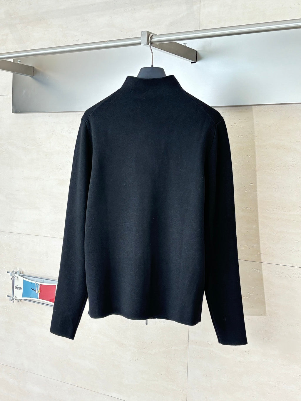 Dior long-sleeve zip jacket, black, back view on hanger