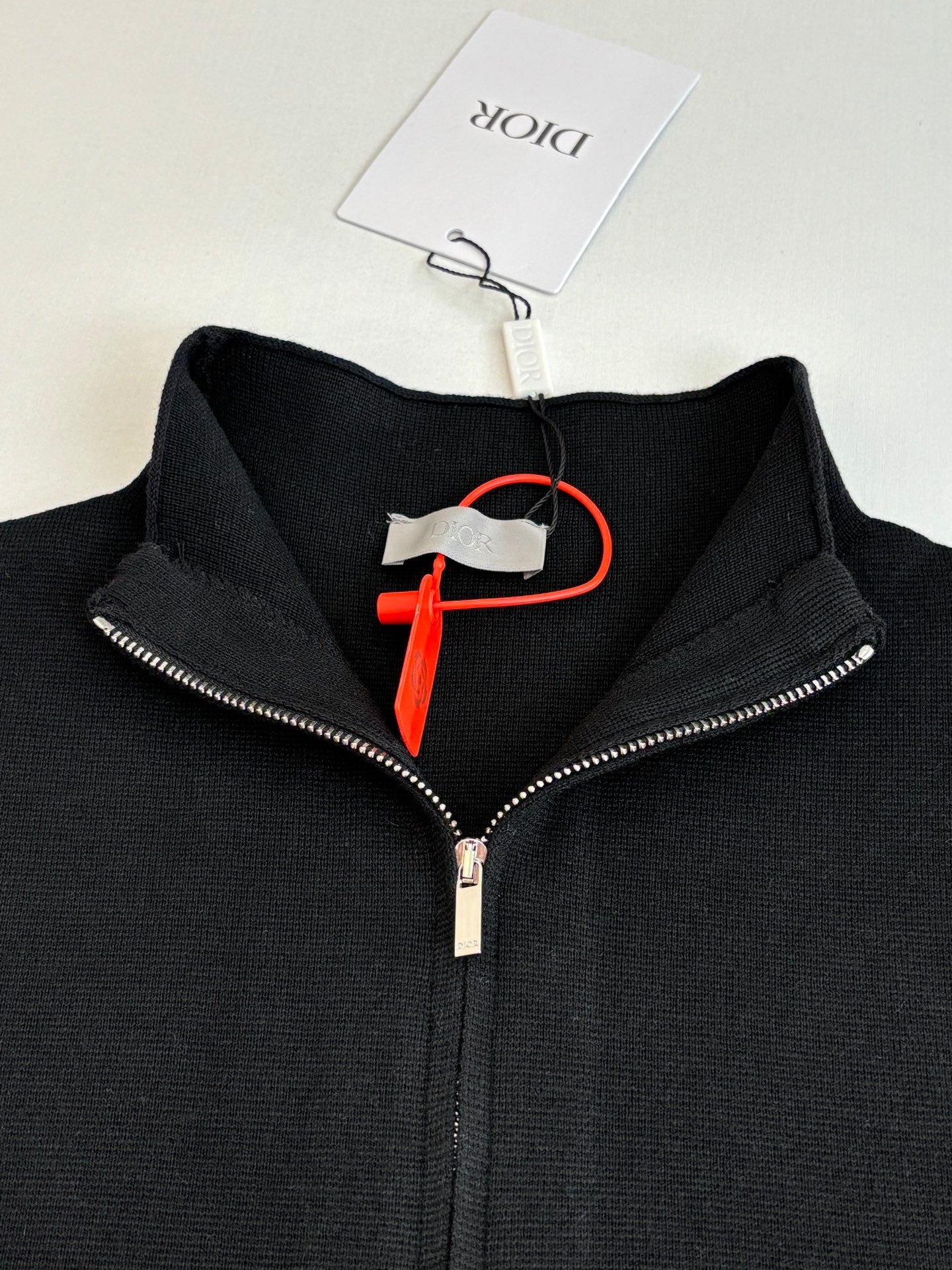 Dior long-sleeve zip jacket neckline, black with zipper and tag