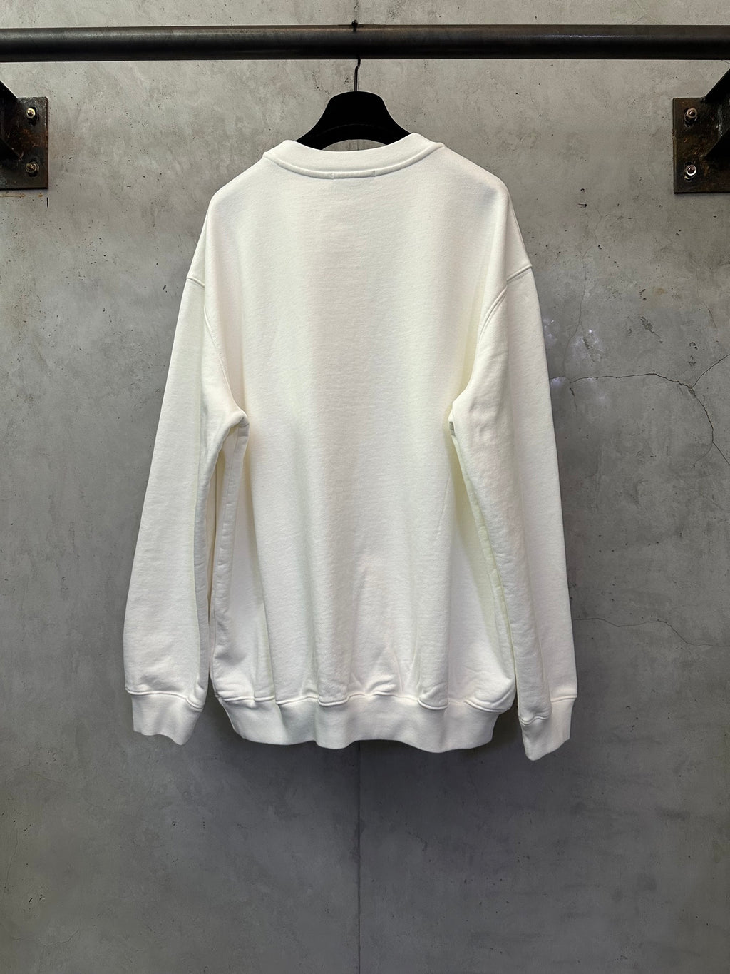 White long-sleeve sweatshirt, plain back with ribbed cuffs and hem
