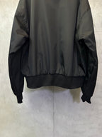 Black bomber jacket with ribbed cuffs and elastic hem band