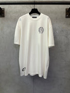 Cream graphic T-shirt with round neck and small chest emblem