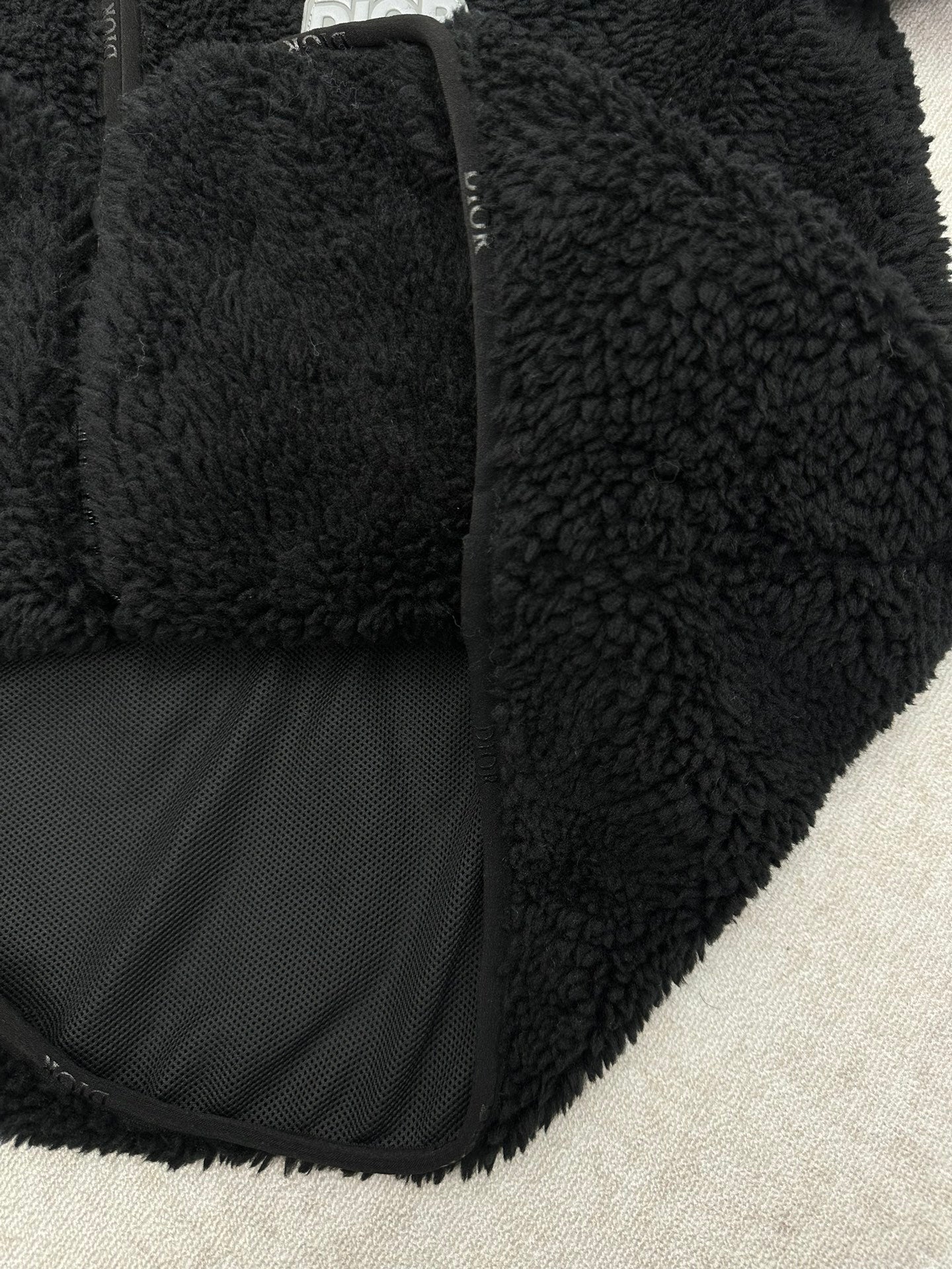 Dior black sherpa jacket cuff and inner lining detail