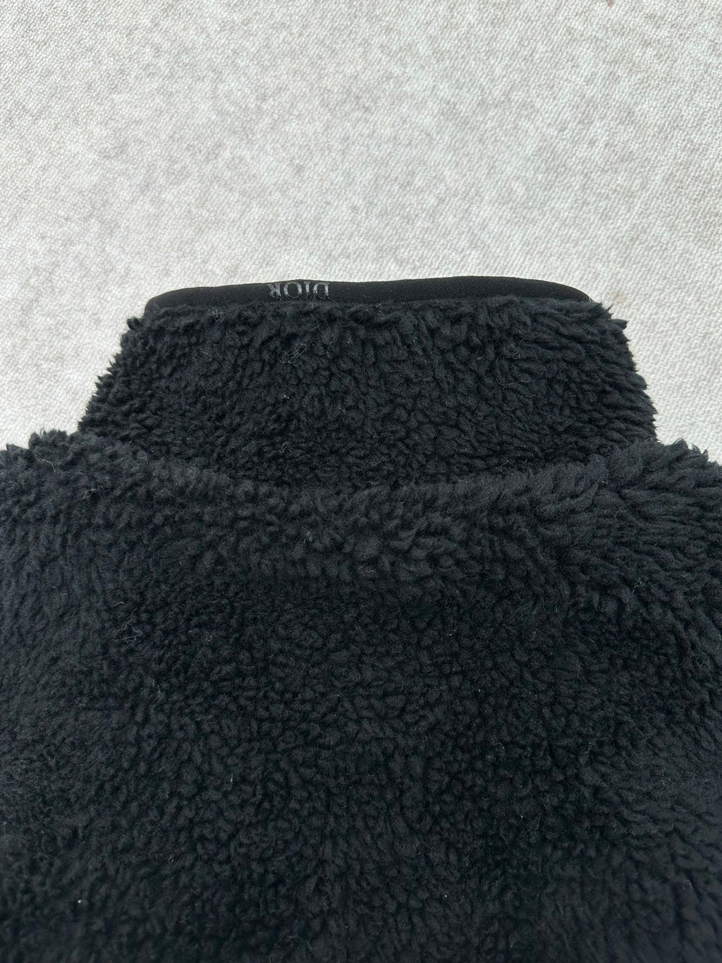 Dior black sherpa jacket collar close-up