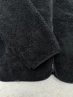 Dior black sherpa jacket side detail with zipper and textured fabric