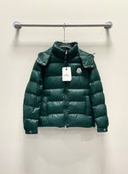 Moncler long puffer jacket, green front view with hood, on hanger
