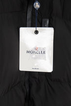 Long black puffer jacket with brand hang tag labeled MONCLER