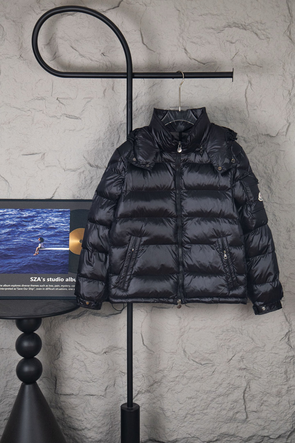 Moncler long hooded puffer jacket, dark, front on hanger