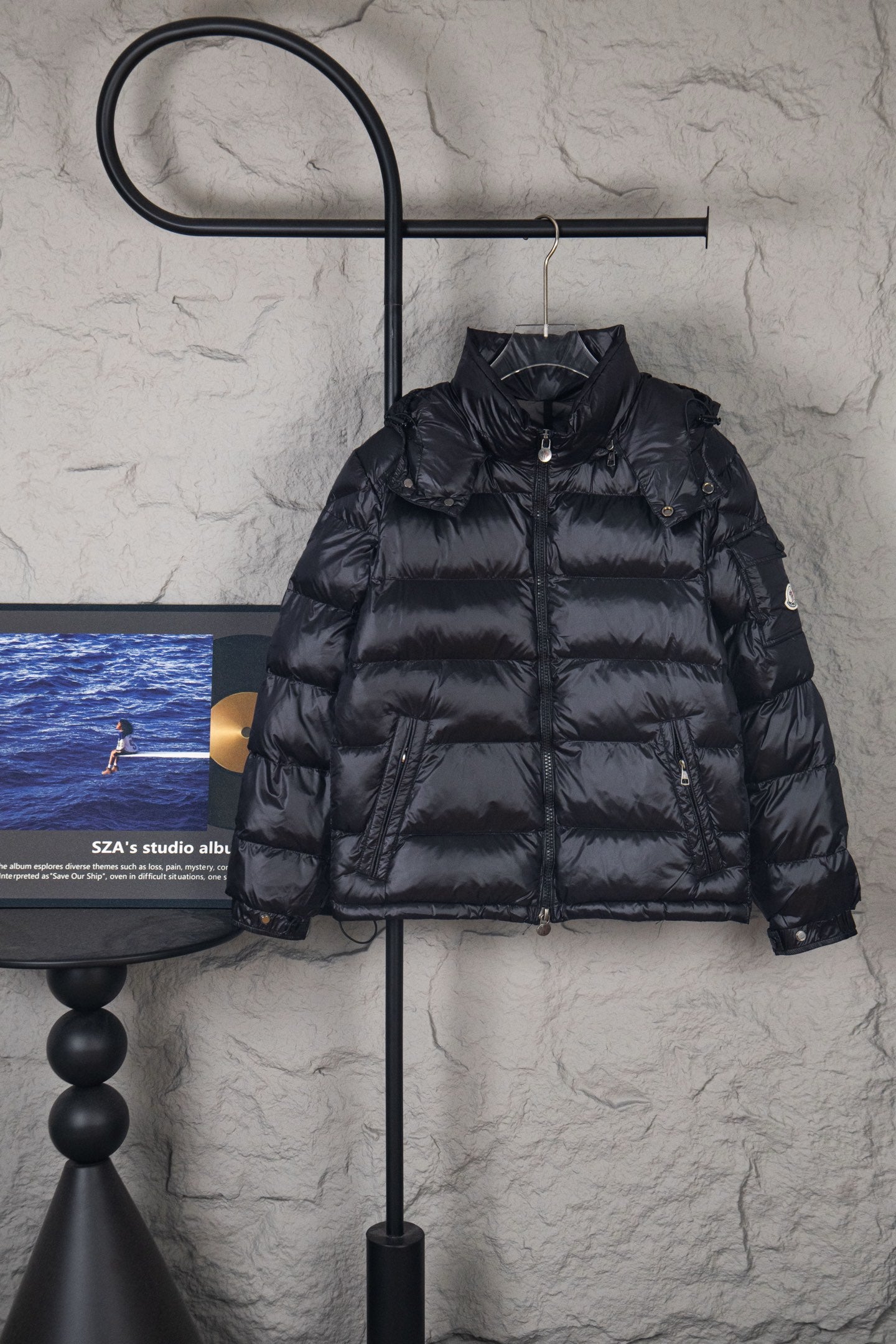 Moncler long hooded puffer jacket, dark, front on hanger