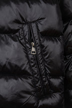 Moncler puffer jacket zipper close-up in dark fabric