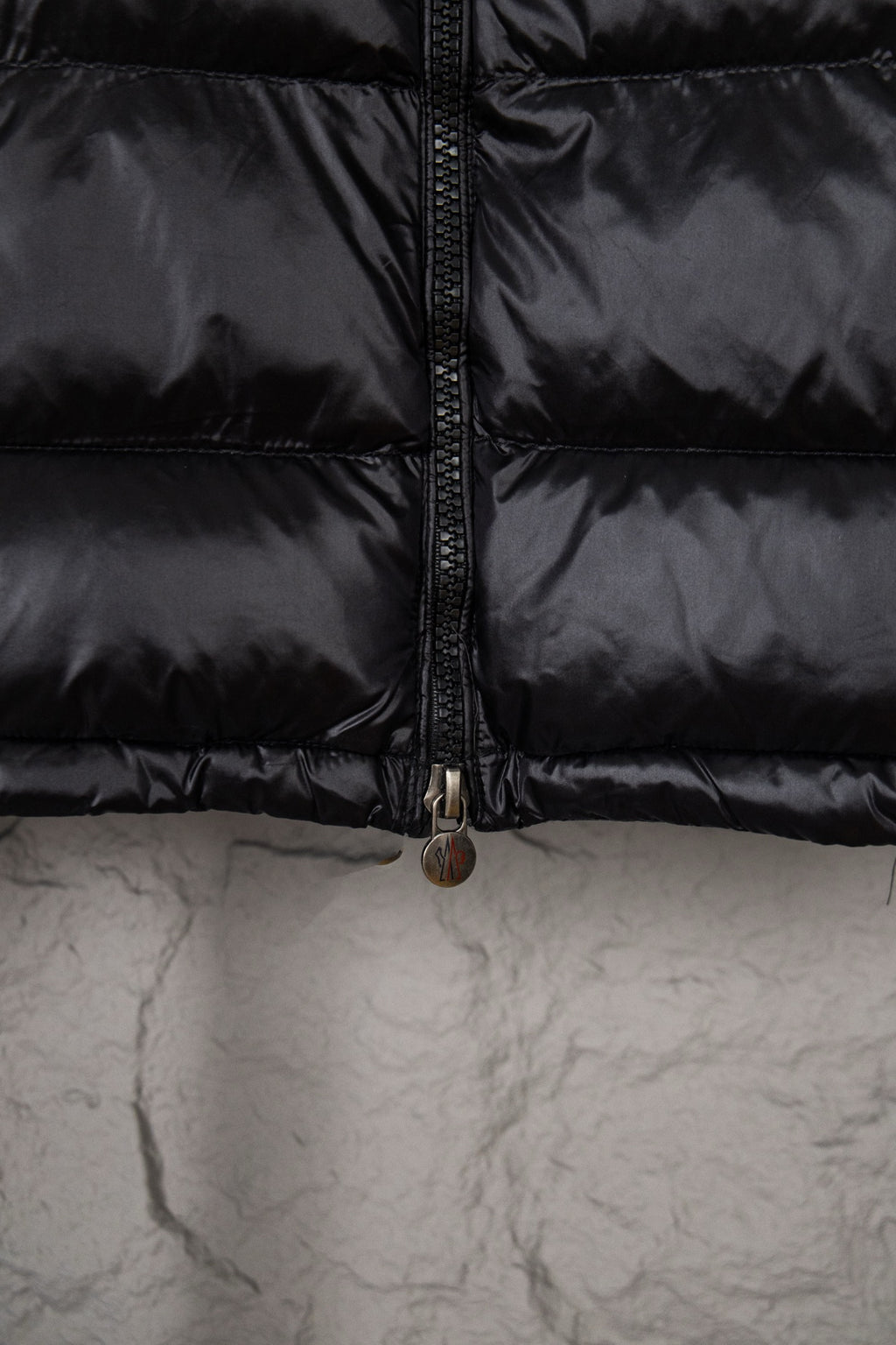 Moncler long puffer jacket with center zipper, dark glossy fabric