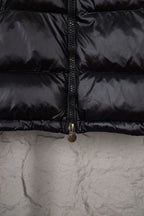 Moncler long puffer jacket with center zipper, dark glossy fabric