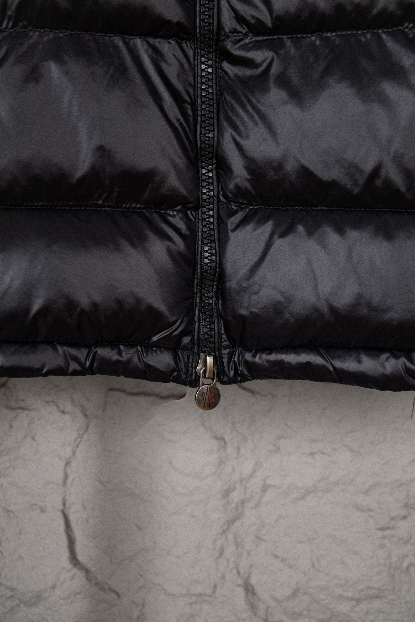 Moncler long puffer jacket with center zipper, dark glossy fabric