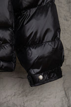 Moncler puffer jacket sleeve with snap cuff detail