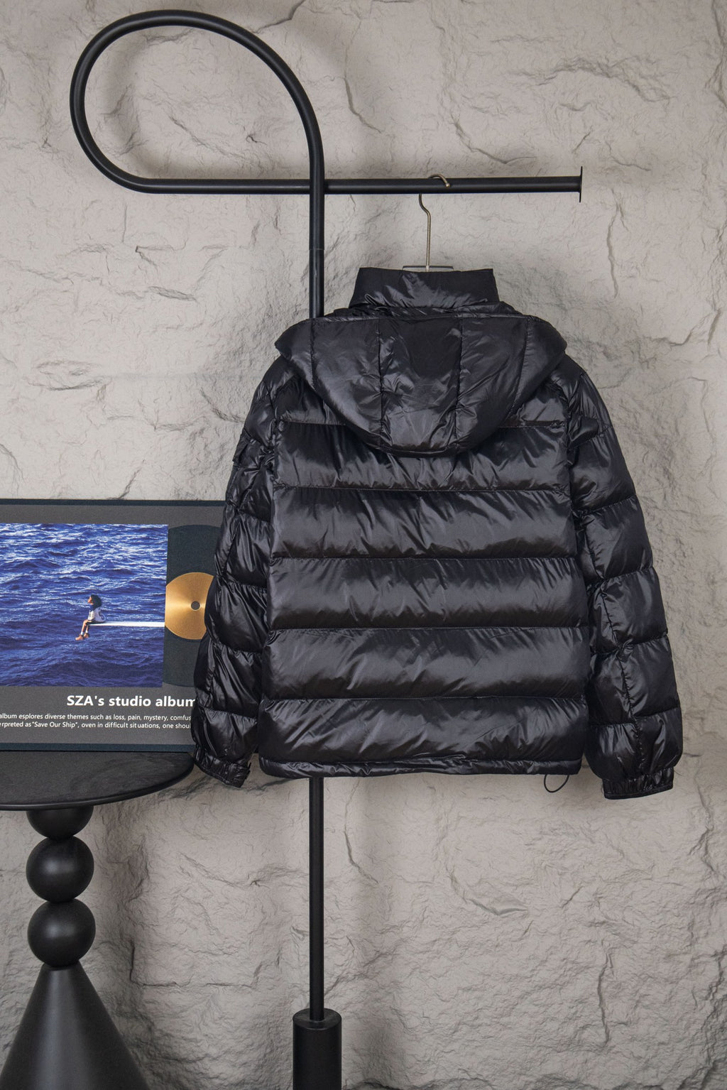 Moncler long hooded puffer jacket, dark, front view with hood