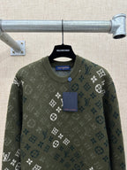 Dark green knit sweater with logo monogram pattern, ribbed crew neck, and buttoned placket