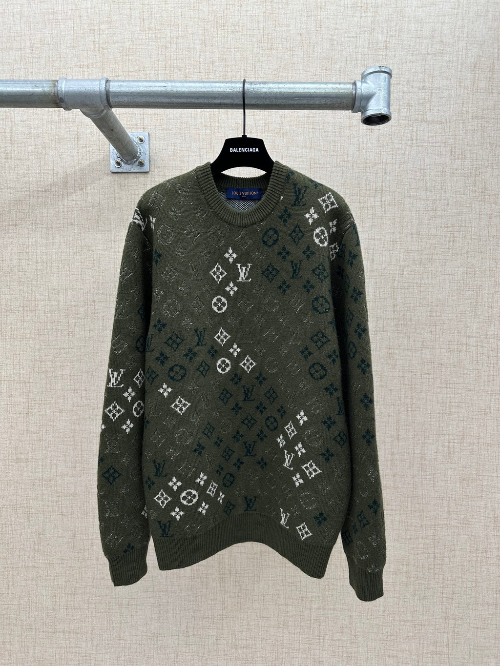 Long-sleeve knit sweater in dark green with all-over logo pattern and crew neck
