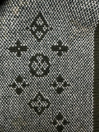 Louis Vuitton long knit garment with black-and-white geometric pattern