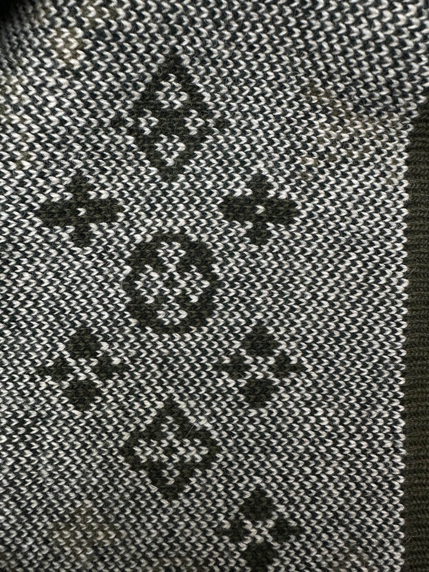 Louis Vuitton long knit garment with black-and-white geometric pattern