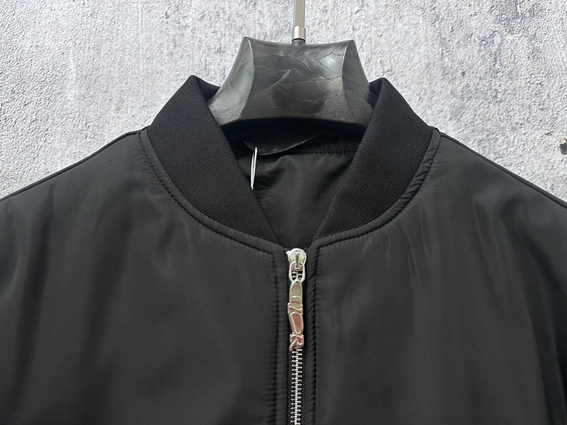 Dior black bomber jacket neck and front zip with metal pull, ribbed collar