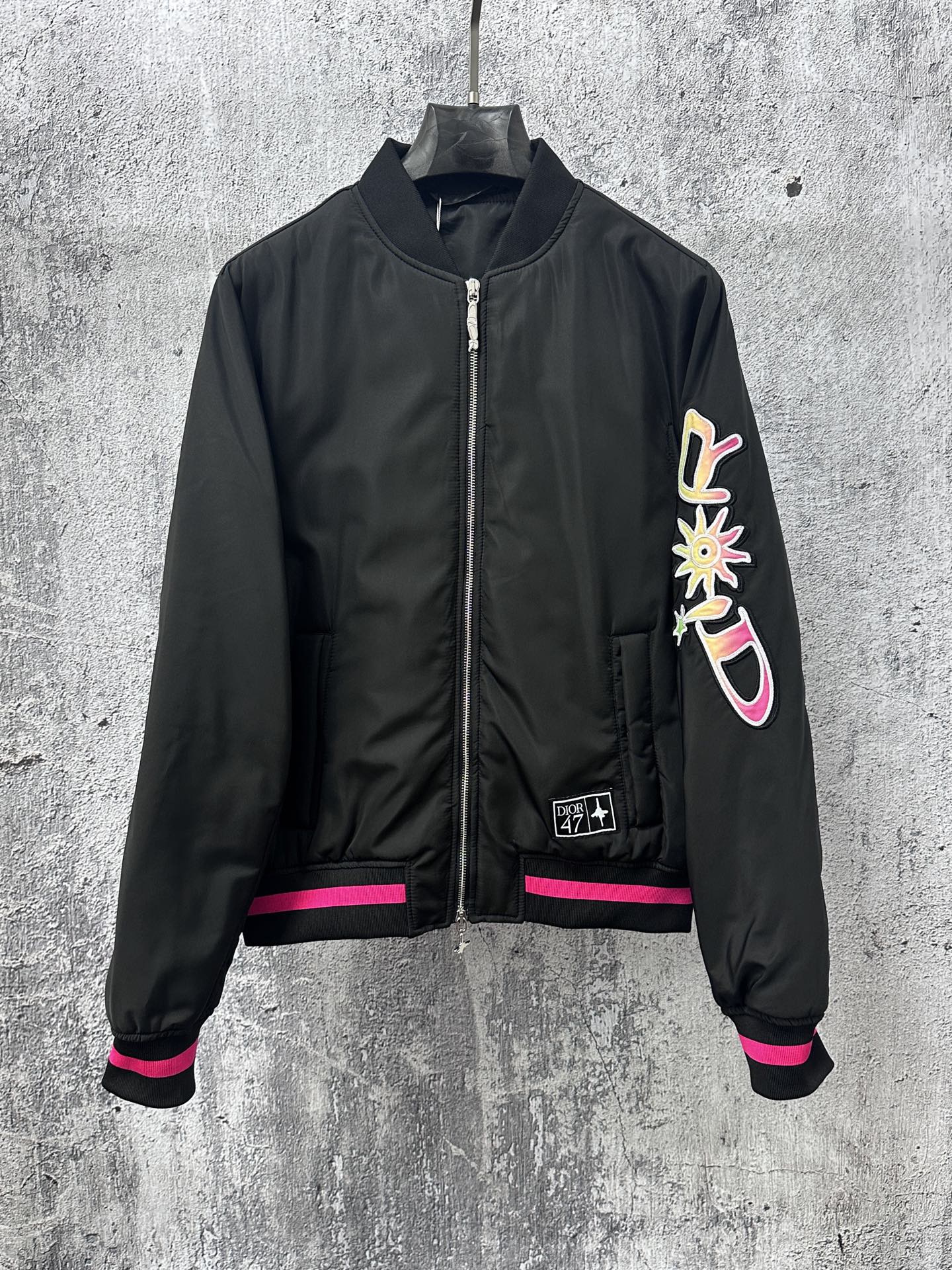 Dior black bomber jacket with front zip, ribbed cuffs, pink stripes, 47 logo patch