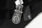 Black hoodie with hang tag and crest logo on fabric