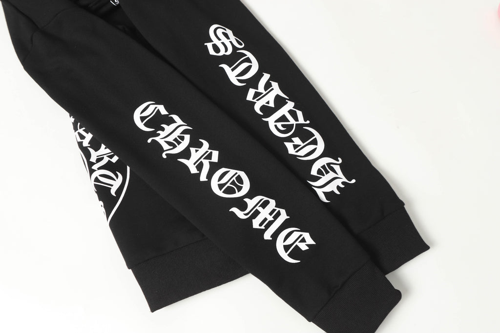 Black hoodie sleeve close-up with white stylized logo text