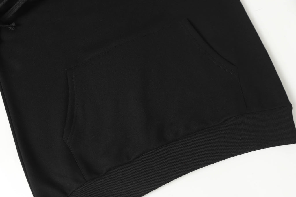 Black long-sleeve shirt with crew neck and seam details