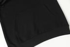 Black long-sleeve shirt with crew neck and seam details