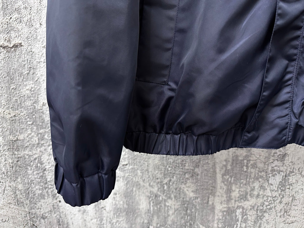 Long hooded jacket sleeve and lower body with elastic cuffs and gathered hem, navy.