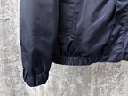 Long hooded jacket sleeve and lower body with elastic cuffs and gathered hem, navy.