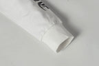 White zip-up hoodie sleeve cuff with folded hem