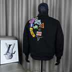 Black Stussy bomber jacket, back graphic patches and multicolor logos