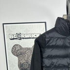 Moncler long puffer jacket front view with stand collar and full-zip closure