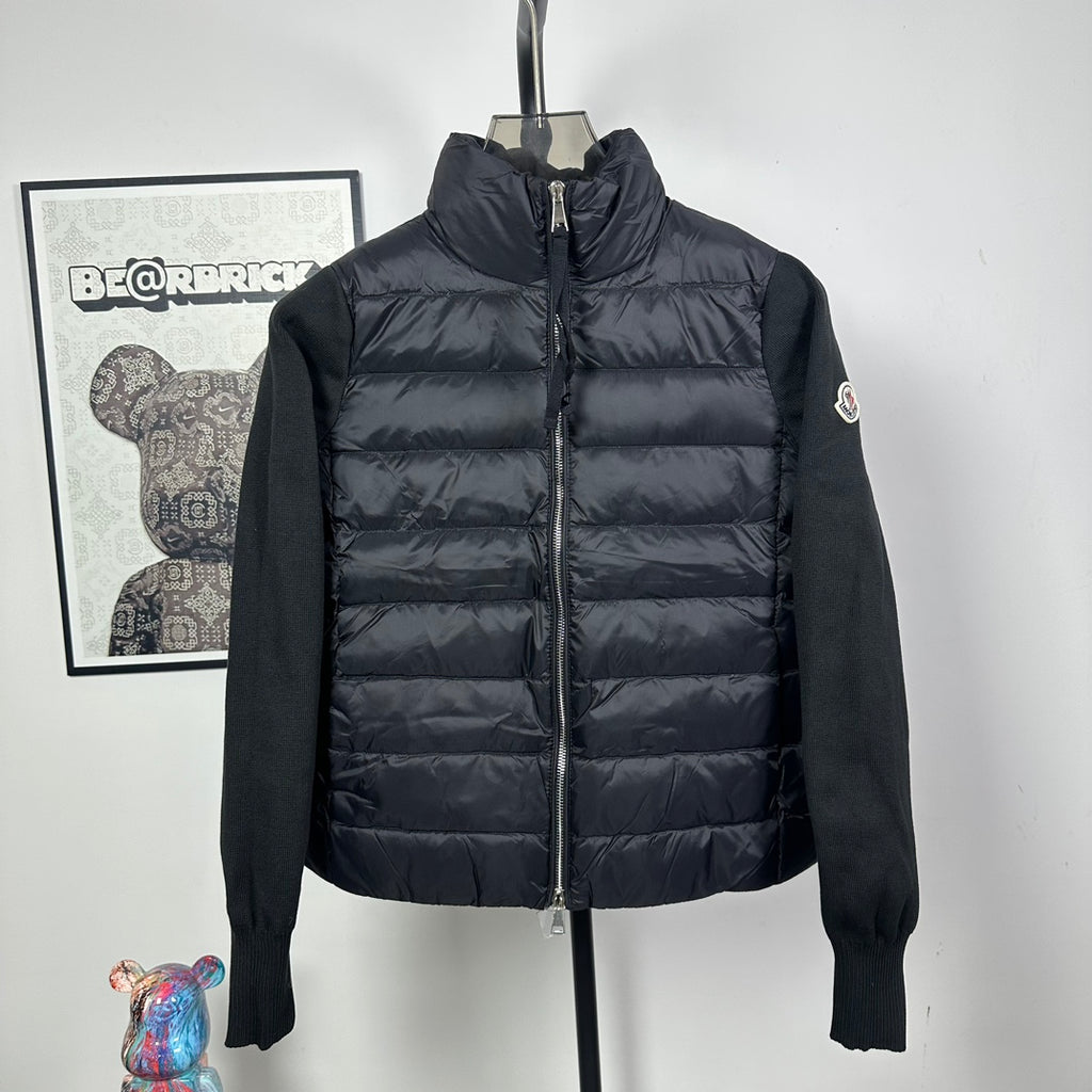 Moncler long puffer jacket with full-zip front and stand collar, dark padded body